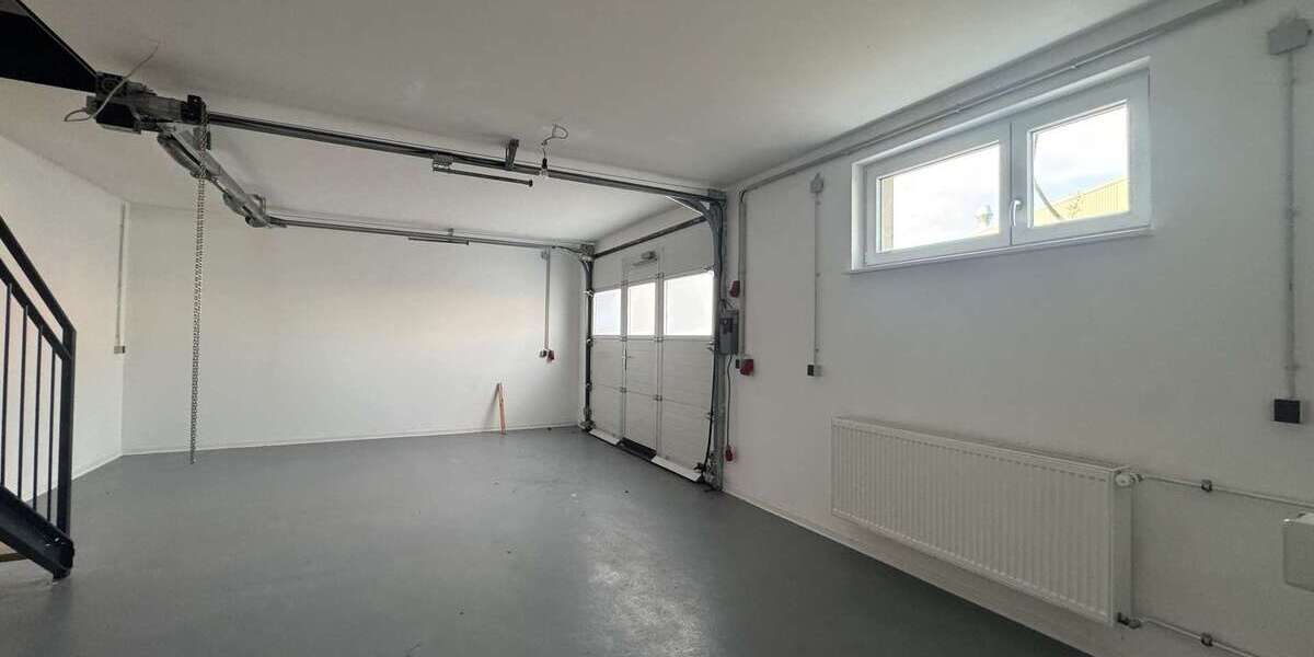 Investieren im Silberstreifen: Wohn-Gewerbeimmobilie mit Garten, Garage & Flexibilitä - Gewerbeobjekt Rheinstetten | Angebot:20367430