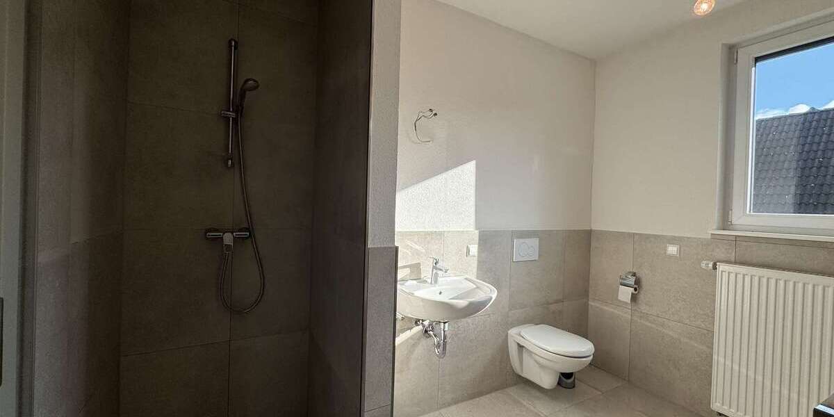 Investieren im Silberstreifen: Wohn-Gewerbeimmobilie mit Garten, Garage & Flexibilitä - Gewerbeobjekt Rheinstetten | Angebot:20367430